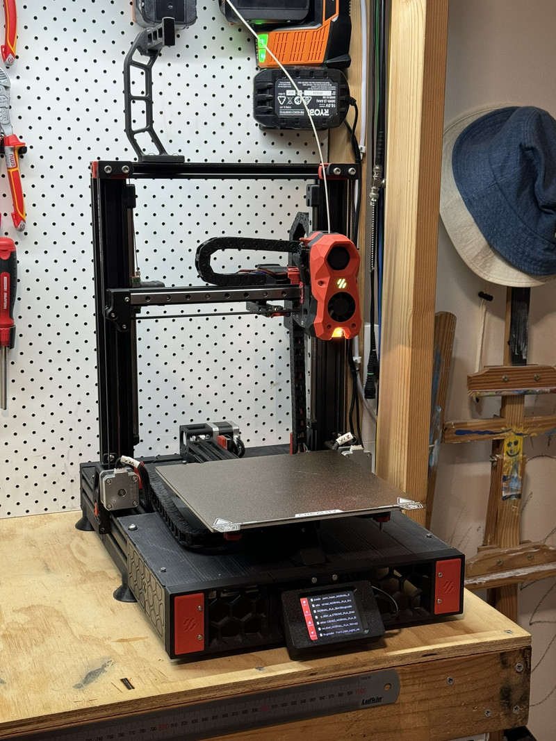 A converted CoreXZ 3D printer on a workbench